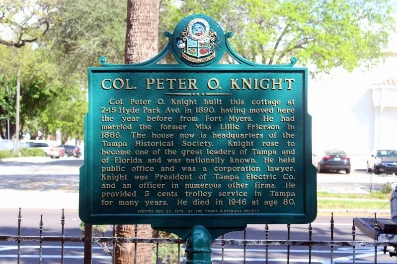 Green and gold Col. Peter O. Knight historical marker erected by the Tampa Historical Society on November 27, 1978, outside the cottage in Hyde Park
