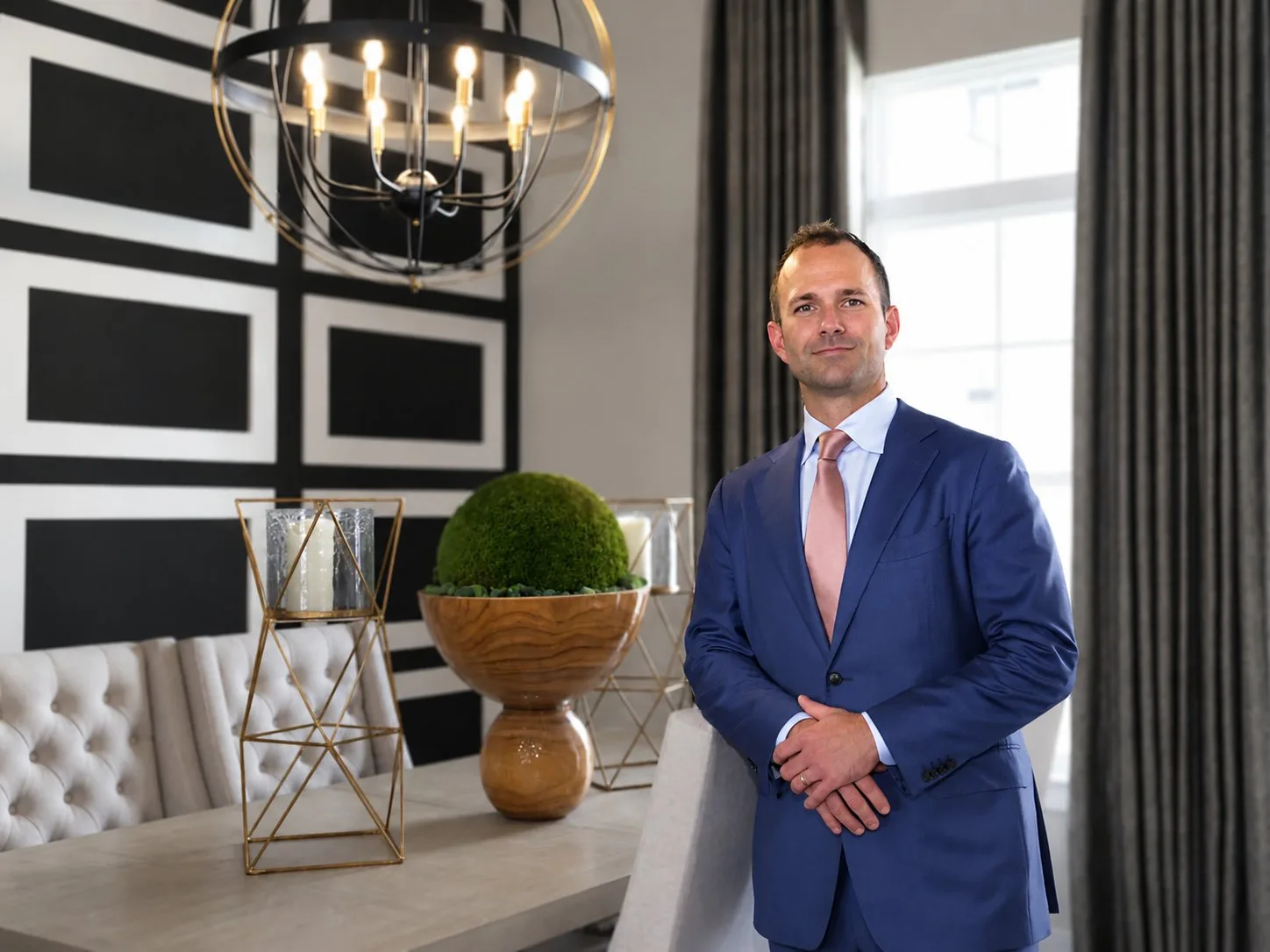 Ignacio Toraño South Tampa real estate agent standing in luxury home